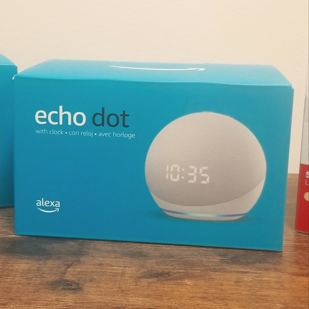 Awesome New echo dot 4th gen. With Alexa and clock.